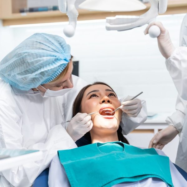 caucasian-dentist-examine-tooth-for-young-girl-at-dental-health-clinic-.jpg caucasian-dentist-examine-tooth-for-young-girl-at-dental-health-clinic-.jpg