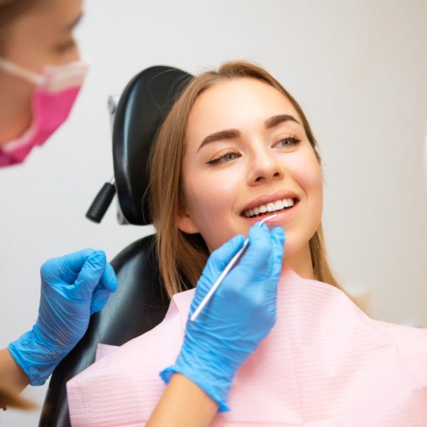 woman-patient-sitting-in-armchair-during-dental-treatment.jpg woman-patient-sitting-in-armchair-during-dental-treatment.jpg